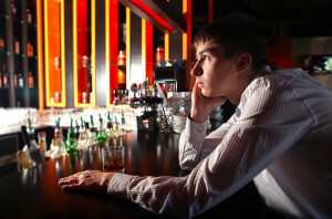 Sad Young Man at the Bar