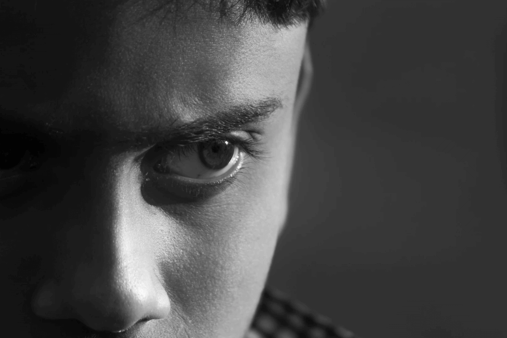 Closeup on eye of face looking anxious