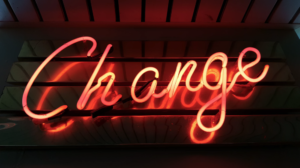 A neon sign of the word "Change"