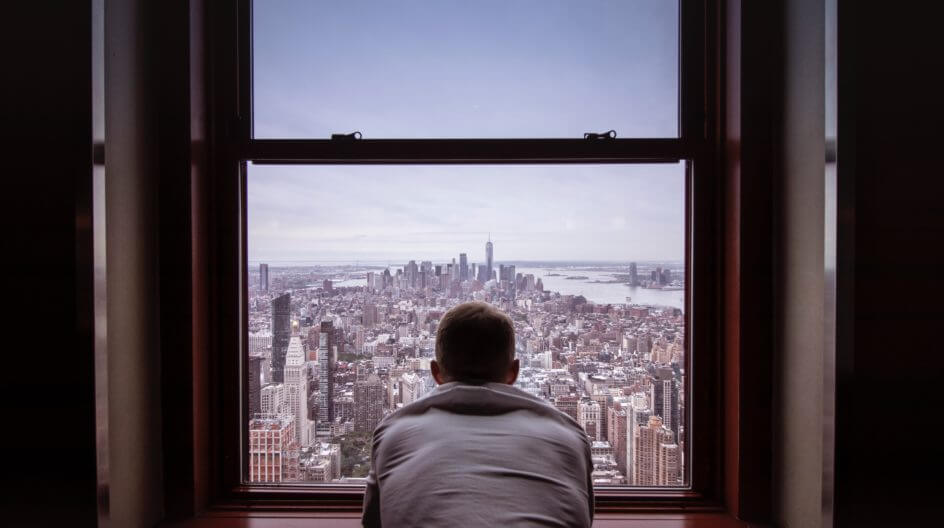 Man looking at city
