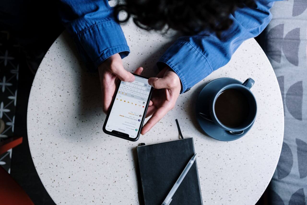 A person using their phone to build social capital online